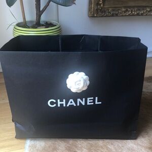CHANEL Black Paper Shopping Bag with White Camellia